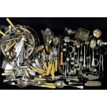 A large quantity of silver plated cutlery, cruets, cake stands etc.