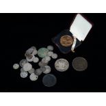 A small quantity of pre 1948 British coins, total weight 2.34oz, together with a John Milton