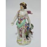 A 20th century Derby style porcelain group depicting Juno with a peacock at her feet, height 27cm.