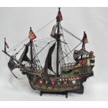 A Tudor style galleon ship model with polychrome decoration to the sails and hull, height 88cm,