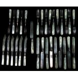 A Victorian part suite of silver and mother of pearl dessert cutlery, comprising ten forks and