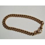 A 9ct rose gold curb link bracelet, weight 26.3g.