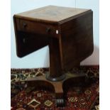 A mid 19th century rosewood drop leaf tea table, fitted a single drawer upon hexagonal pedestal with