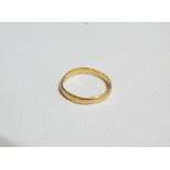 A 22ct gold band ring, weight 1.7g approximately.