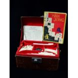 A mid 20th century Chinese Mah Jong set in fitted faux leather case, appears complete.