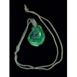 An early 20th century Lalique style glass pendant necklace in the form of stylised leaves, length