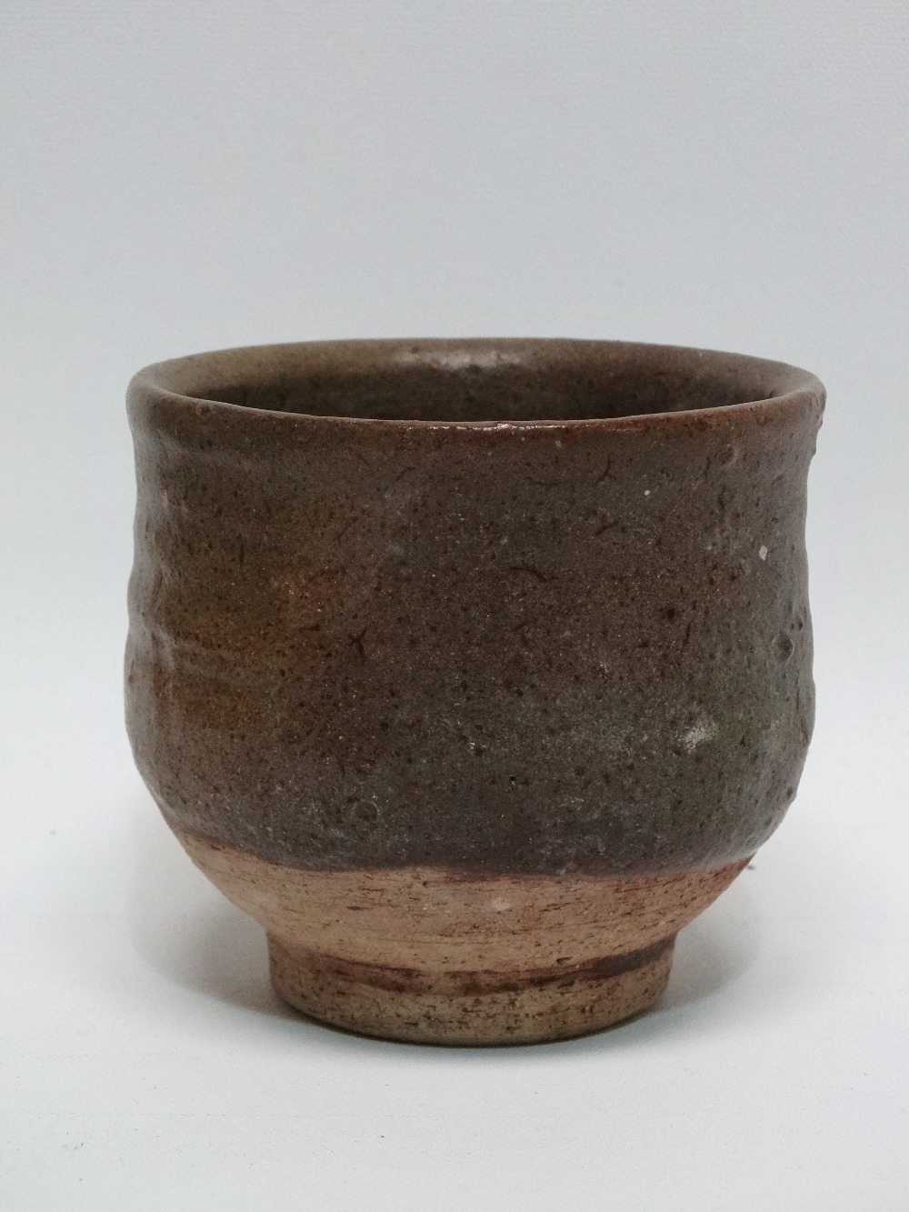 TREVOR CORSER (1938-2015) An ash glazed yunomi Impressed potter's mark and St Ives Pottery mark