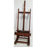 An oak artist's adjustable easel, height 209cm