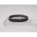 Art Deco bracelet - A square cut blue and brilliant chip cut white stone set bracelet with