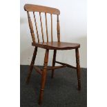 Four stickback chairs - A set of four 19th century elm seated ash stickback kitchen chairs with ring