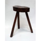 A rustic milking stool - A 19th century stool, with three legs of octagonal form and a sawn log