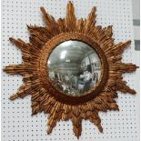 Sunburst convex wall mirror - The plate mirror surrounded by gilt acanthus leaf and radiating sun