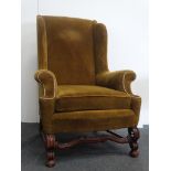 Victorian wingback armchair - An upholstered overstuffed 19th century chair with wavy front
