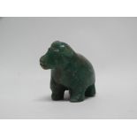 Jadeite - A green carved figure of a water buffalo, height 4cm, length 5.4cm.