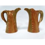 Royal Worcester - A pair of gilt fern small jugs with green mark to base, height 8.5cm.