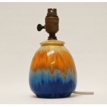 Ruskin Pottery - A high fired, drip glazed ceramic lamp base, various marks including 1931 to