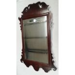 George III mahogany wall mirror - A bevelled glass plate with shaped mahogany surround, height 80cm,