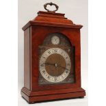 Elliott bracket clock - A burr walnut cased break arch dial bracket clock with Tempus Fugit boss