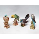 Beswick animals - A cuckoo No.2315, a kestrel No.2316, a parrot on a tree stump No.930 and a