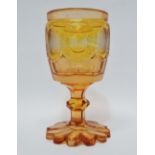 Bohemian Glass - An amber pedestal goblet with flush cut vignettes of Chateau d'Eberltein and four