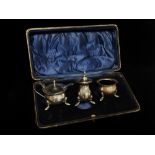 A cased silver cruet set, Birmingham circa 1938, maker's mark for S Blanckensee & Son Ltd.