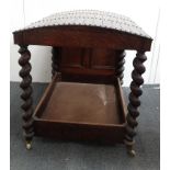An early 20th century oak dog bed - A miniature four poster bed style with turned barley twist