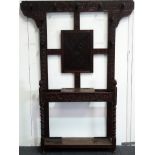 Victorian oak hallstand - A carved oak nine hook coatstand with umbrella stickstand, with glove box,