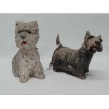 Two painted reconstituted stone figures of Highland terriers for Buchanan's 'Black and White