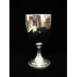 A tall silver pedestal trophy cup, completely unmarked, London 1913, maker's mark for Elkington & Co