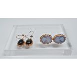 A pair of 18ct gold and cameo glass earrings - The oval stud earrings with a profile image of a