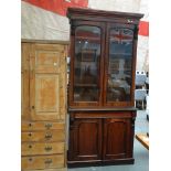 An early Victorian glaze top bookcase - A mahogany twin glaze door top before four adjustable height