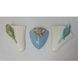 Sylvac - A pair of wall pockets with hand painted budgerigar decoration, each No.1956 to reverse,