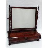 A 19th century mahogany dressing table mirror - A cylinder fronted two drawer base mirror with ebony