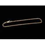 A 14ct gold bracelet - A 14ct gold cylinder link chain bracelet with lobster claw catch, length