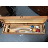 Croquet - A pine box with four oak round mallets, each weighing approximately 1.35kg, six hoops,