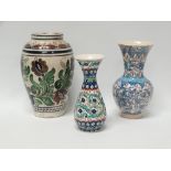 Persian and Hungarian Pottery - A baluster shaped flared rim vase with hand painted acanthus