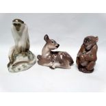 Royal Copenhagen animals - A baboon No.1444, height 12.5cm, a recumbent fallow deer fawn No.2609 and