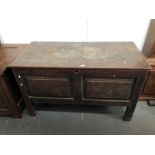 17th century oak coffer - A two panel front with original wire hinge opening, tall styles of dowel