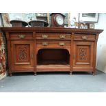 Victorian golden oak sideboard - A serving table comprising four drawers and two cupboards with an