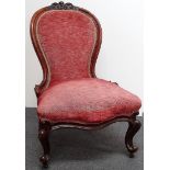 Victorian nursing chair - An overstuffed mahogany framed upholstered shaped front leg chair with