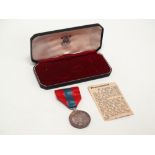 MILITARIA - A cased Imperial Service medal awarded to Edith Ethel Perry, marked in edge, cased and