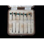 A cased set of silver cocktail sticks with enamel terminals modelled as cockerels, Birmingham 1935.