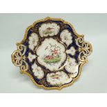 Royal Worcester - A puce mark hand painted dish having ho-ho birds to centre and with gilt and