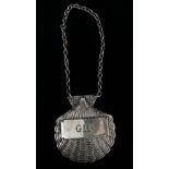 A silver scallop shaped embossed bottle tag/decanter label 'Gin', Sheffield 1989, maker's mark for