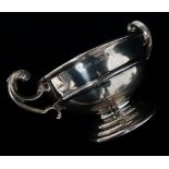 A silver twin handled pedestal bowl, Birmingham 1907, maker's mark for Charles Westwood & Sons,