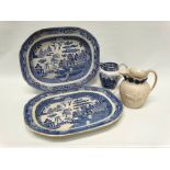 19th century blue and white ceramics - A pair of 'Three Man Willow Pattern' meat plates, 44.5 x 35.