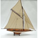 Ship model - A scale built model of 'Per Mar Per Terram' a circa 1900s racing yacht on wooden stand,