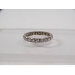 Platinum and diamond eternity ring, size O/P.