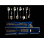 A set of six silver apostle spoons, Birmingham 1909, maker's mark for Henry Williamson Ltd, a silver