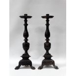 Florentine - A pair of cast brass triangular Florentine candlesticks with turned decoration,